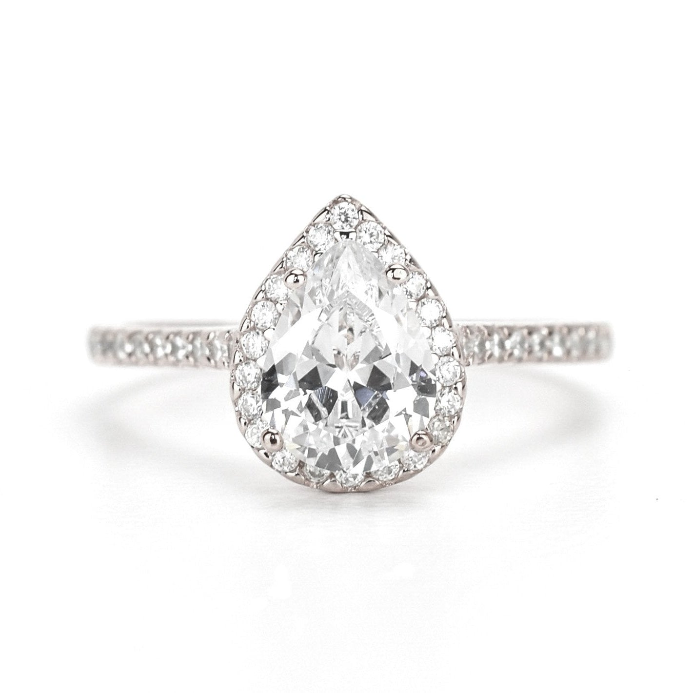 Peervormige ring met stenen, rose ring met stenen, peer ring rosegoud, verlovingsring dames, ring peervormige steen, druppelvormige ring met steen, trouwring goud