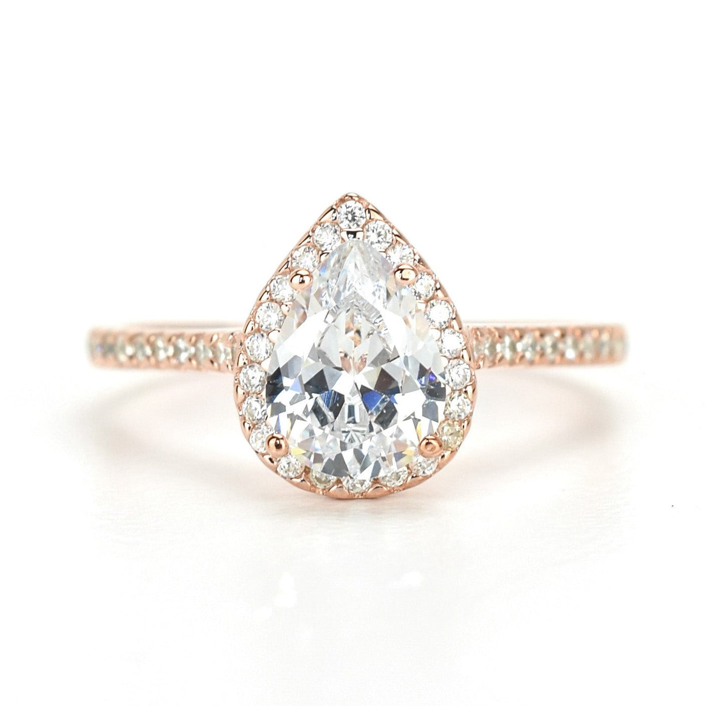 Peervormige ring met stenen, rose ring met stenen, peer ring rosegoud, verlovingsring dames, ring peervormige steen, druppelvormige ring met steen, trouwring goud